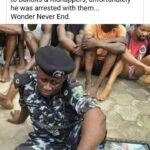 Police clarify viral photograph alleging a Deputy Commissioner was arrested aiding bandits with weapons