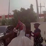 VIDEO: Nigeria Police officer hands over AK47 to bride who shot it during wedding